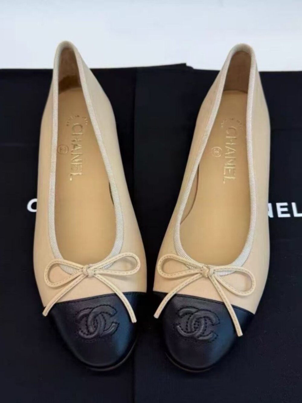 CHANEL Beige Black Ballet Flats